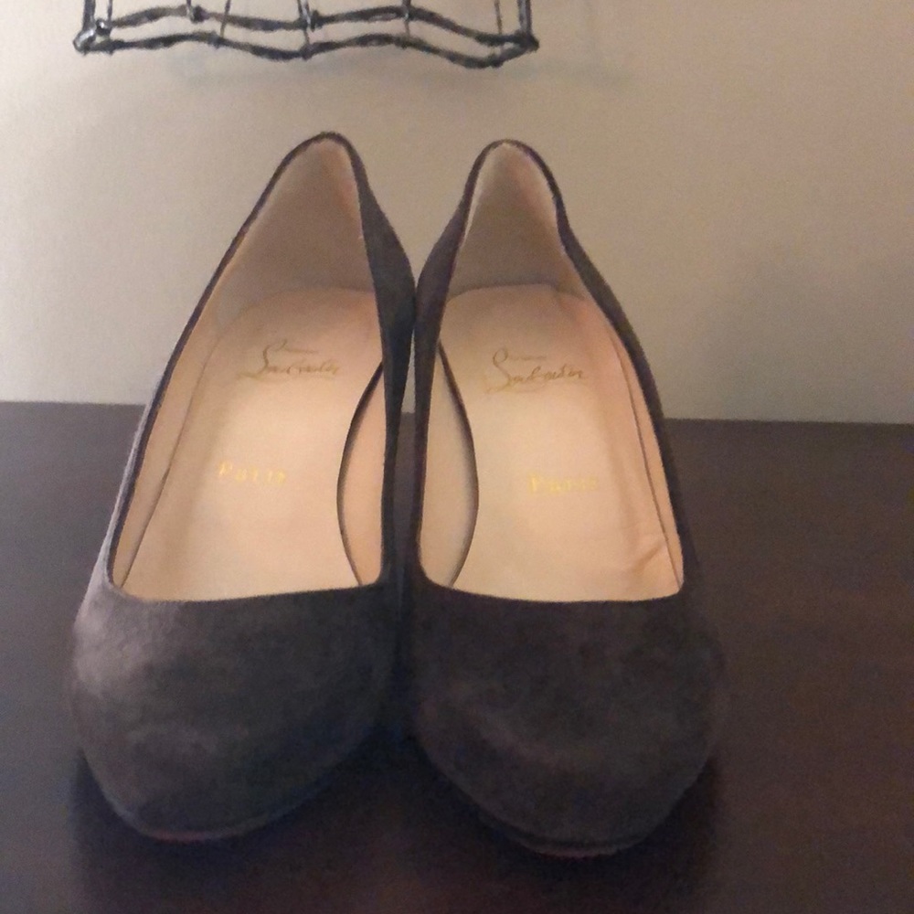 Brown suede wedges and yes they are red bottoms!